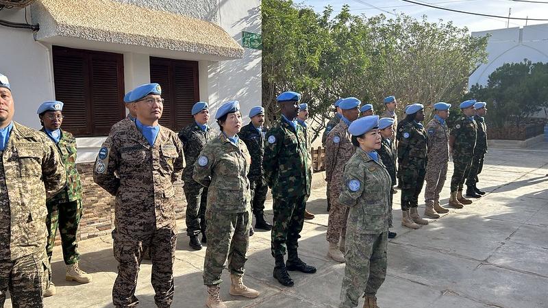This image links to MINURSO'S Flickr account Group of UN Military staff standing in formation