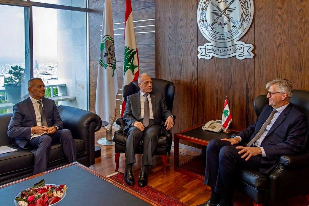 High level representatives attend a meeting.